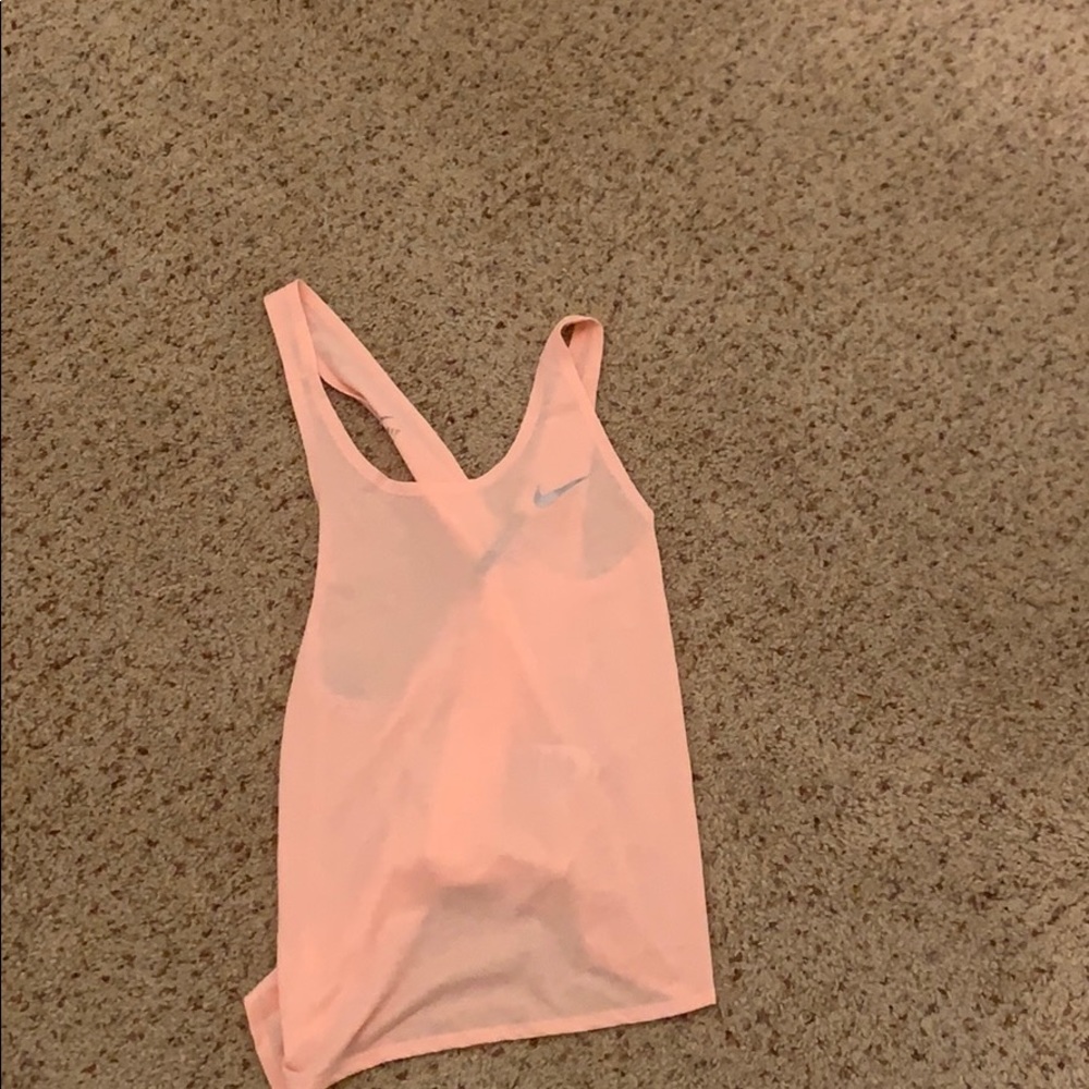 A coral tank top